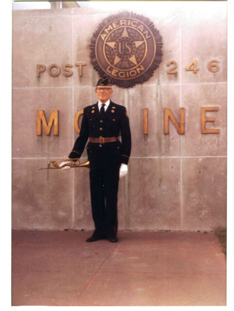 Old soldier poses with his bugle at the American Legion post in Moline, Illinois. Grandpa Logan blew "echo taps" from afar for burials . When he died and was buried at the Rock Island National Cemetery, another person blew "Taps" for him.
